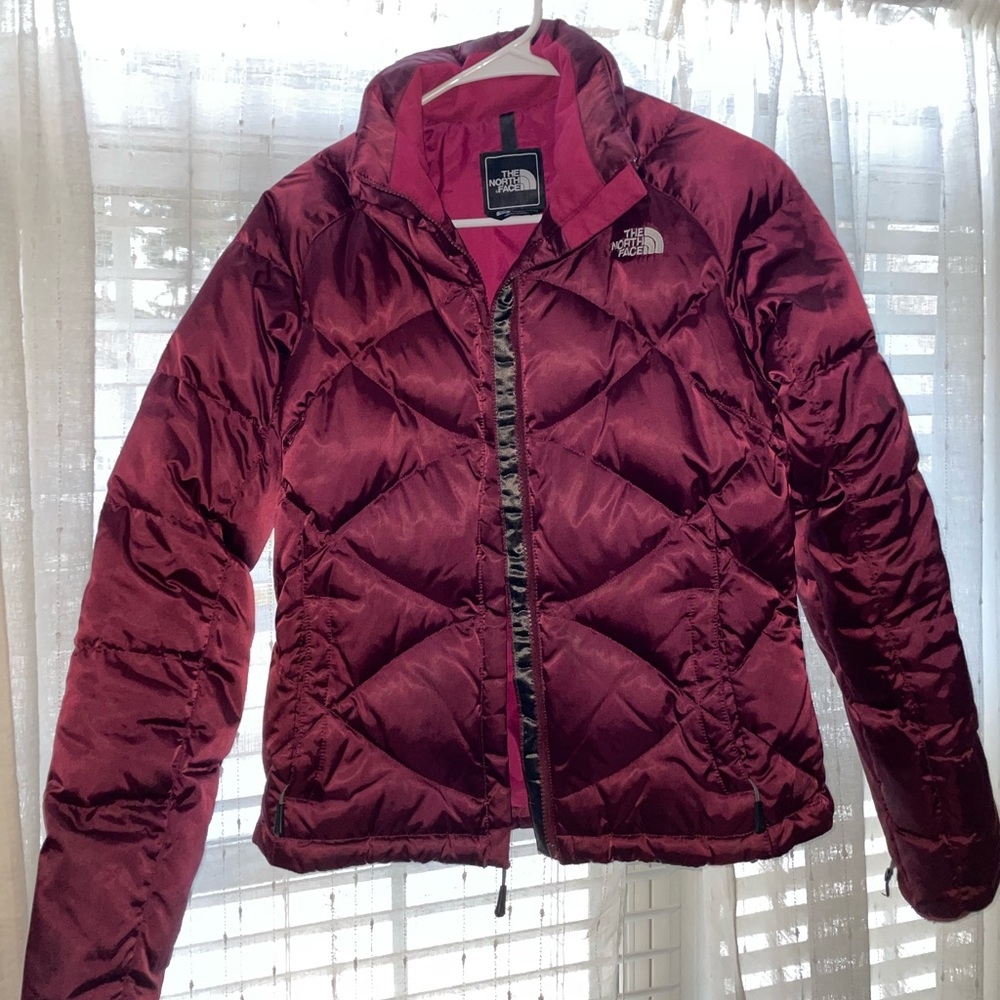 Woman’s small maroon puffer